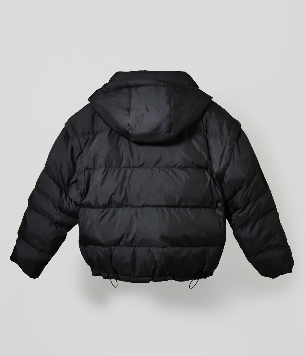 Black puffer jacket back view with hood