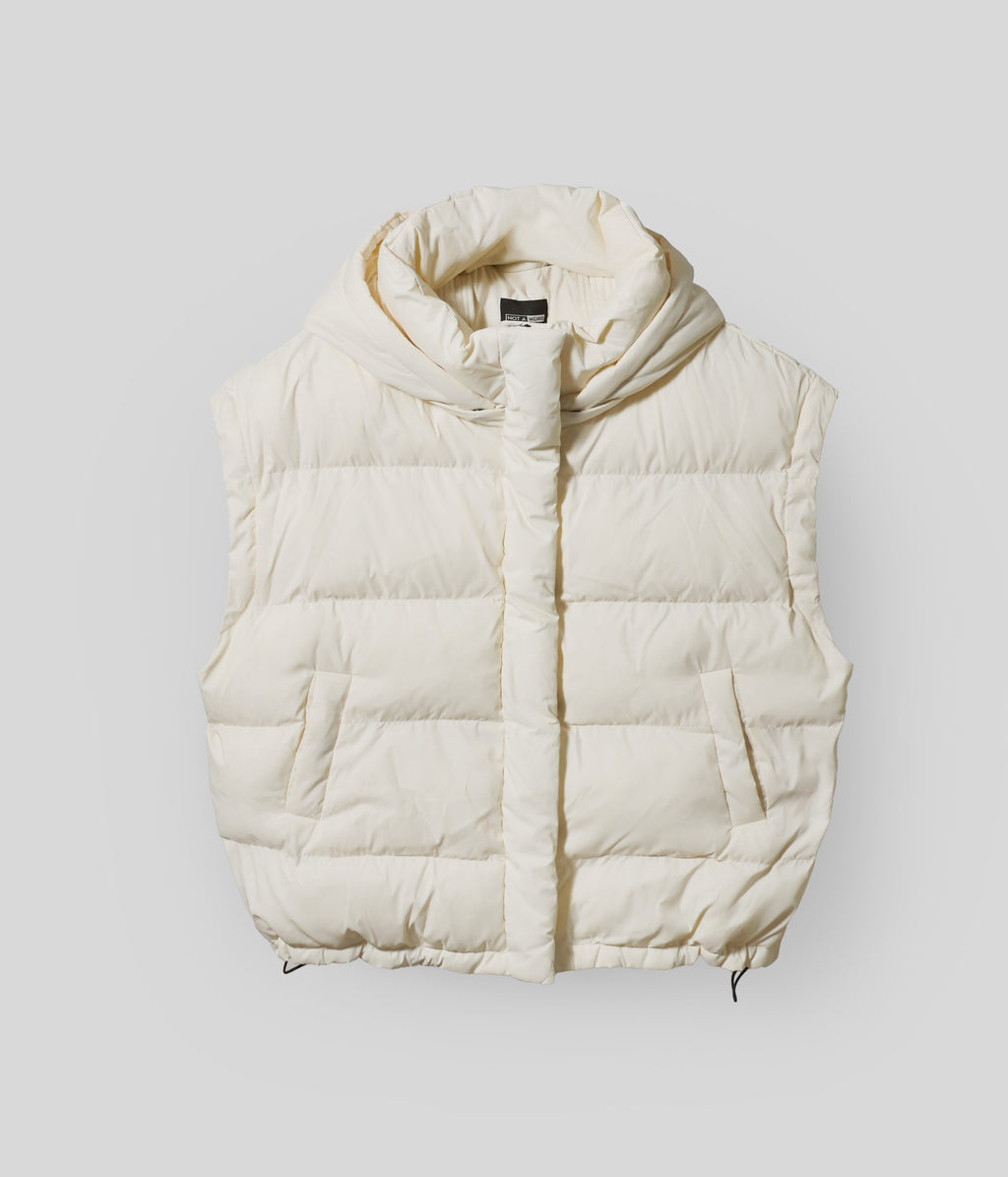 White Wavy puffer vest with detachable sleeves removed
White Wavy 2-in-1 jacket worn as vest
